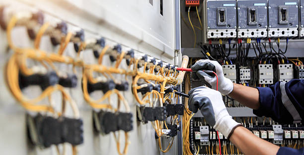 Professional Electrician technician working in Point Clear, AL